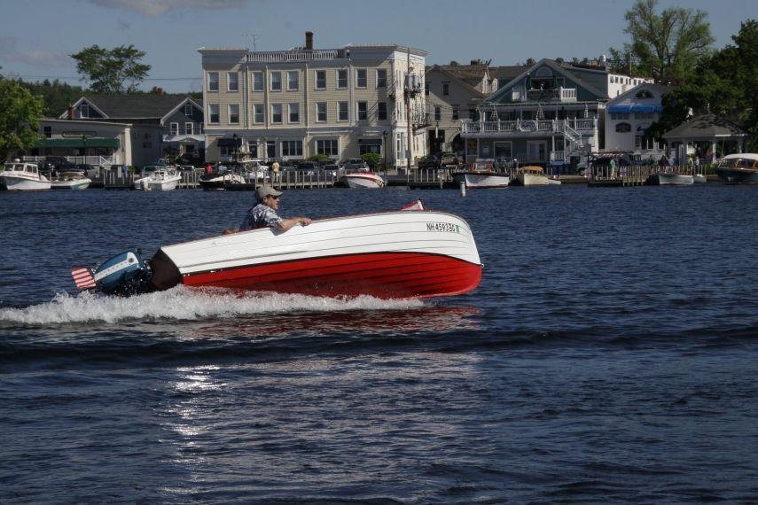 Picture of our Lyman taken by our friend Eric Sojka.
Wolfeboro Town Docks in the background, during the Antique Lyman Boat Show.
