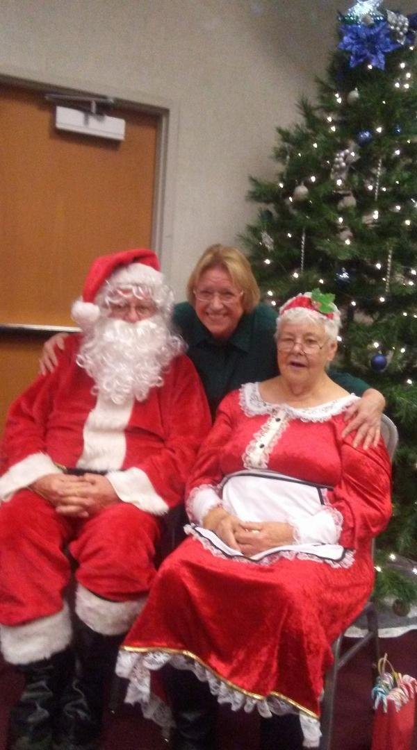 This is me at the Lions Club Arts & Craft Fair with Mr & Mrs Claus (Ben & Kay Dickens)