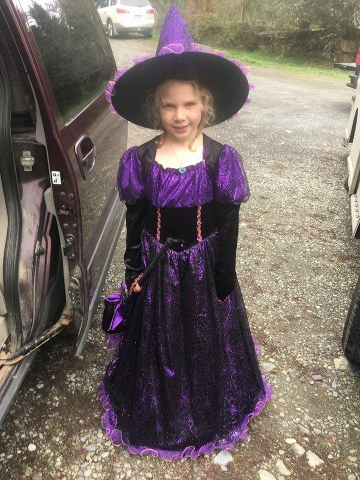 My little sweetie grand daughter Andi her favorite colour purple rockin the halloween party