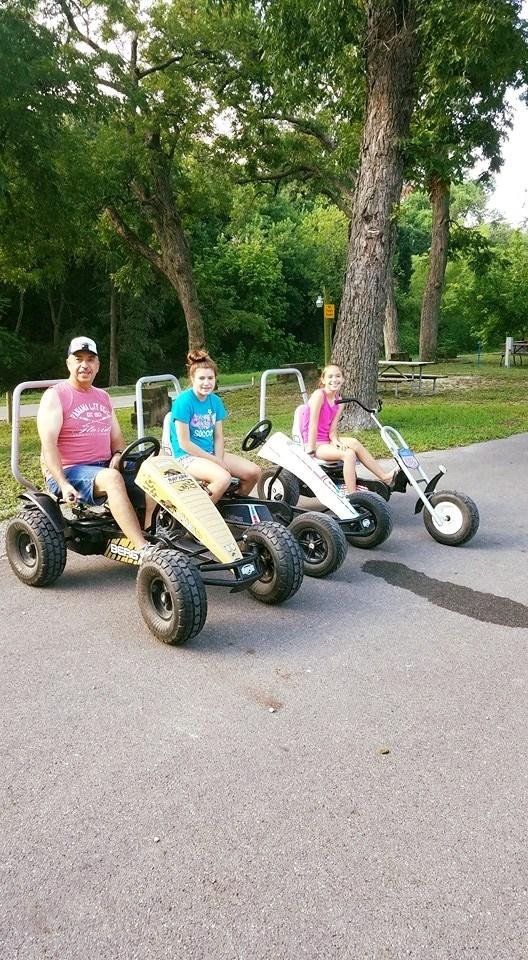 Savannah, Taylor & Grandpa going for a bike ride at KOA Campground in San Antonio