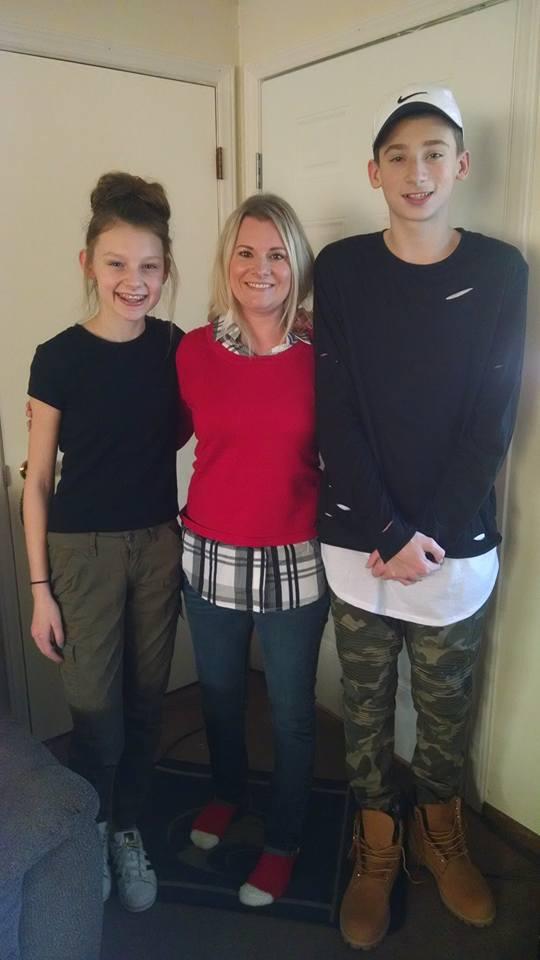My daughter and grandkids! He is measuring about 5' 10"! Grew like 6 inches this year! Hope everyone had a Merry Christmas! Was special to spend with my grandkids this year! They are growing so fast! We measured them al