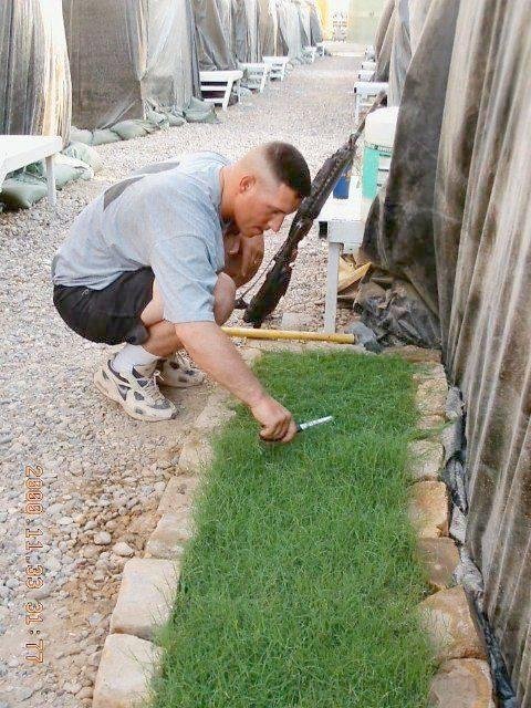 I  can't think of a better word than "PRICELESS" FOR THIS....

I hope the picture will go through for you - of this Army soldier in Iraq with his tiny 'plot' of grass in front of his tent.  It's heartwarming!  Here is a sol