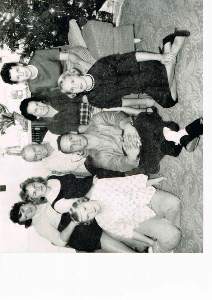 Here is a picture of my grandfather Joe Angell and his wife Goldie Angell and all of there children,including my dad Durward Angell and all of his sisters.
