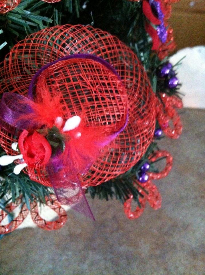 Final four hats on my tree. I just love this tree. It also has red hearts, purple bows...lovely.