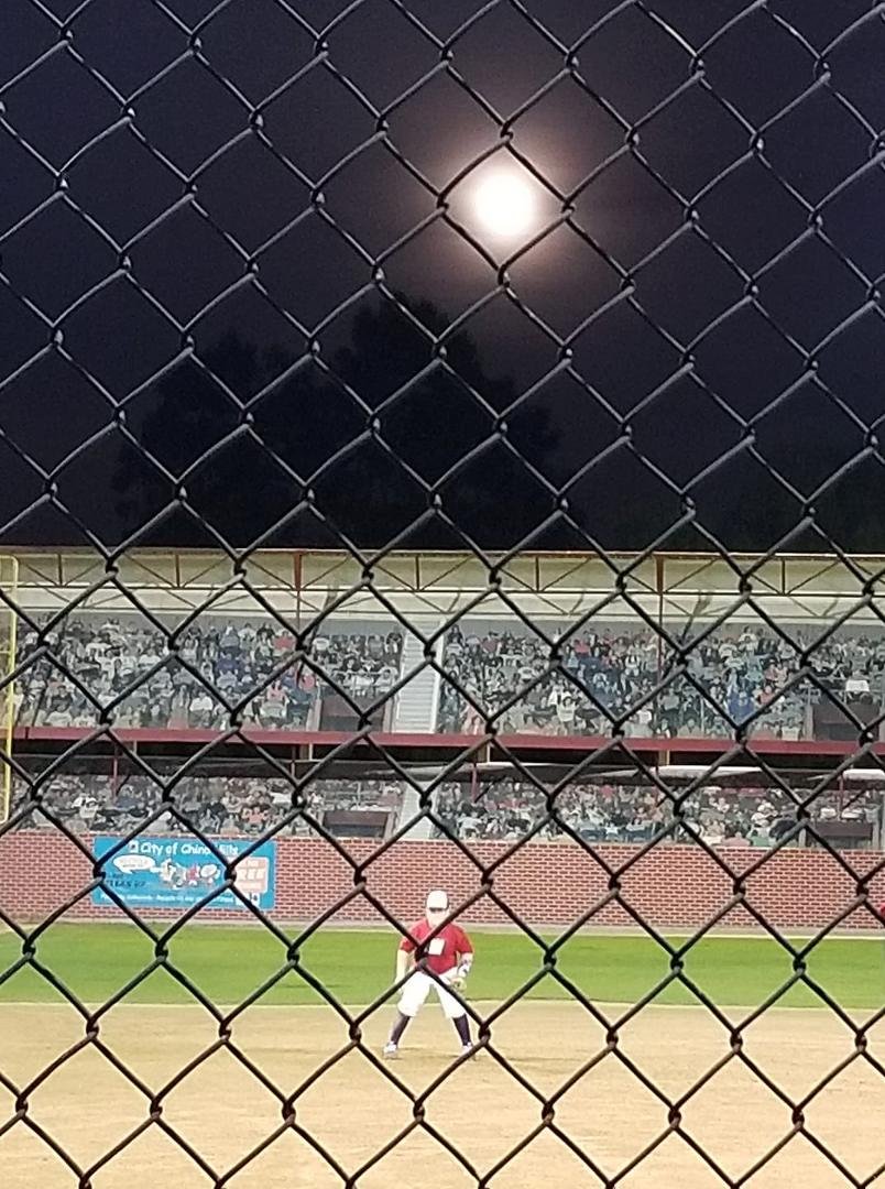 Under the lights and full moon.