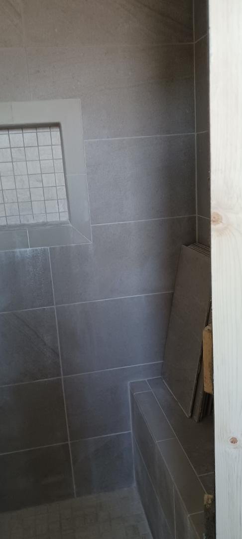 Repairs that Christi Galla had to do. The repairs to the Master Bathroom that needed to be done to install a glass door in the shower