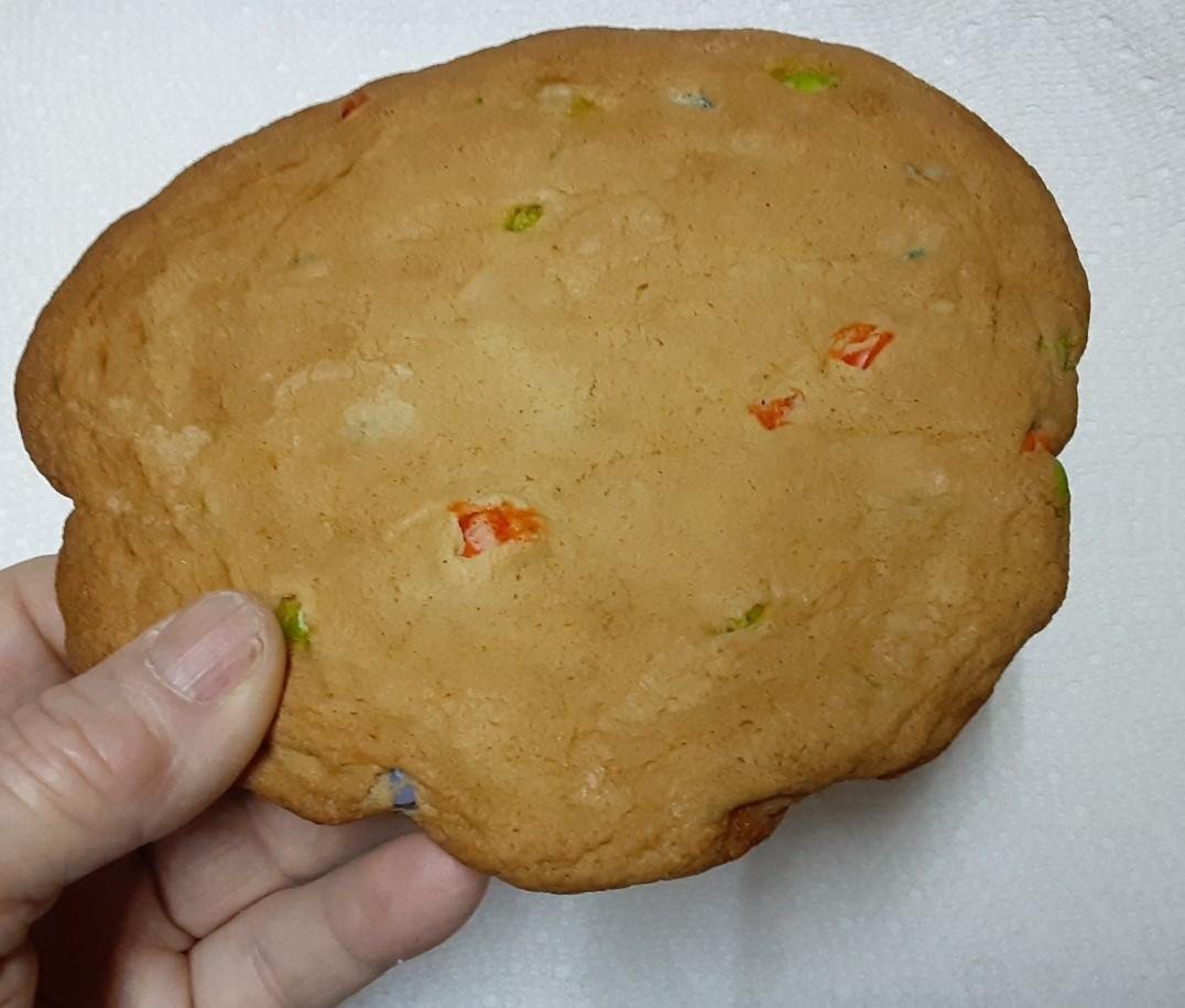 When I make cookies and get to the last of the dough and don't have enough to make a full baking sheet I like to make one big Cookie