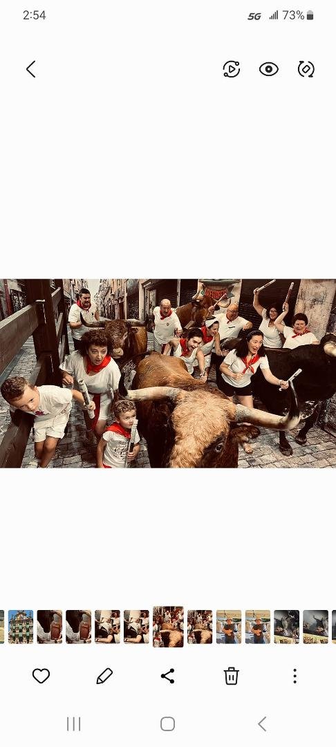 In Pamplona,Spain running with the bulls.