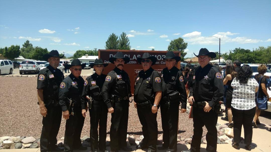 Photo from Funeral for former City of Douglas Chief of Police Charles Austin on July 5, 2016.

Left to right: Capt. Mike Gross, Tombstone Company; Lt. Wolf, Douglas Company; Lt. Linda Lant, Tombstone Company; Col. Kenn Barr