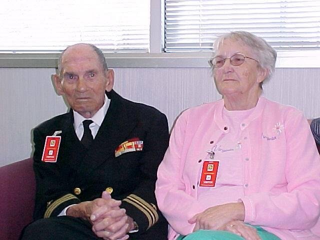Mum and Da patiently awaiting the Enlistment Ceremony of their grandson Rory