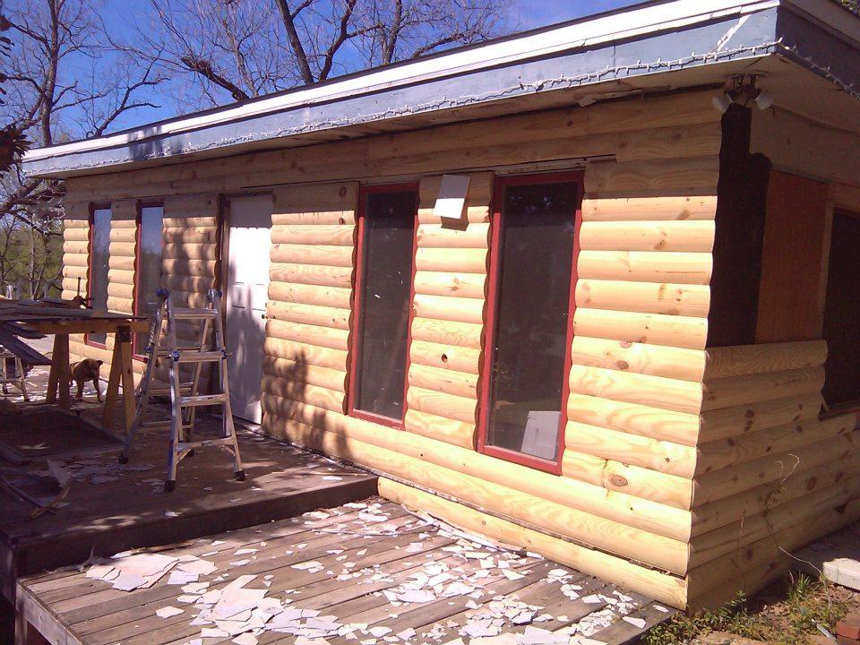 Another photo of the siding and windows.