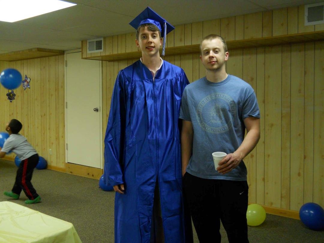Andrew's High School Graduation. He's 6 ft. 7 in.tall, beating out Matthew at 6 ft.
