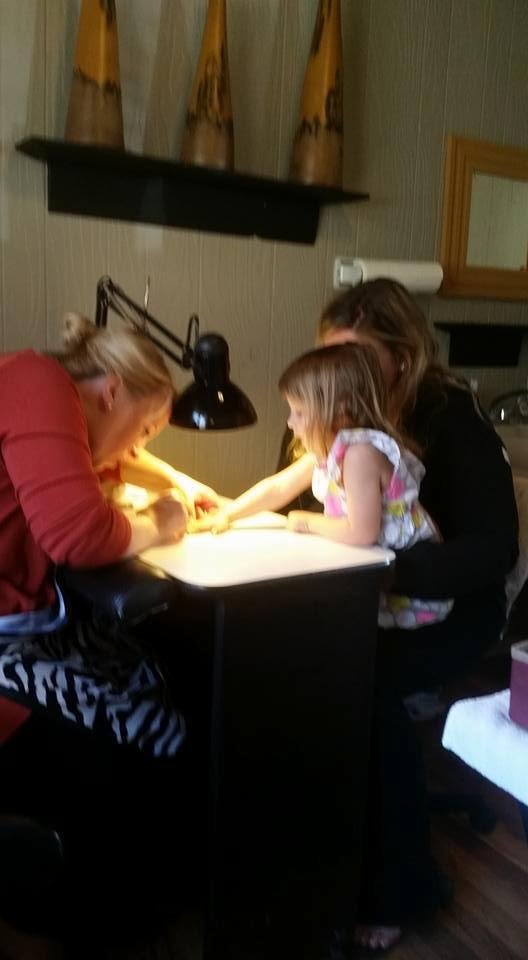Having fun getting Mother's Day pedicures for Holly and me, and manicure for little Miss Chloe. Thanks Crystal Schmidt at Holly's Hair and Nails of Crosslake!