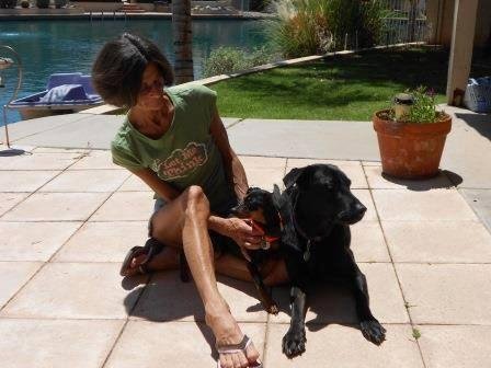 Me, :Pita & Kilo enjoying the warm tile in the backyard
