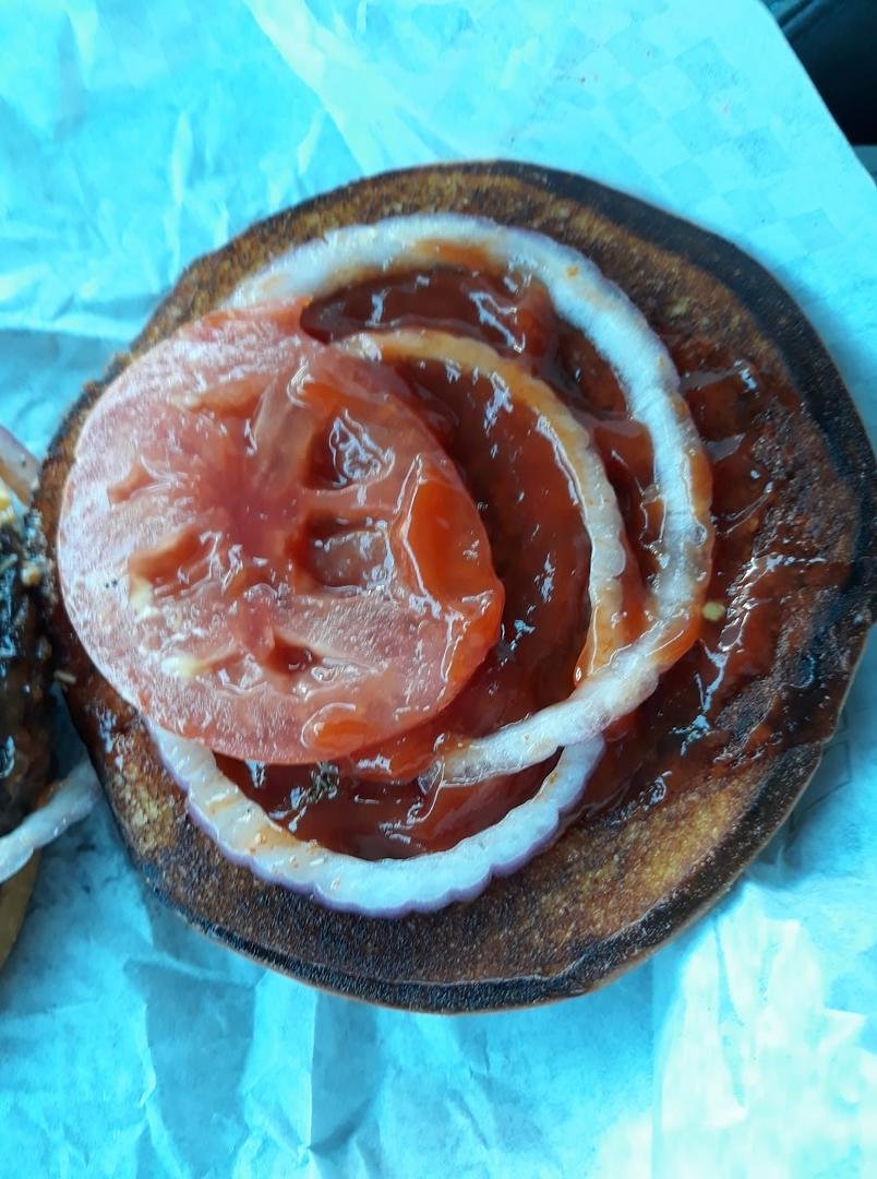 This was the burnt bun on my gourmet supreme this morning at the Eldorado Spangles. Did you know they now film interactions in the drive thru with their customers. It took 15 minutes to get that cheeseburger even though t
