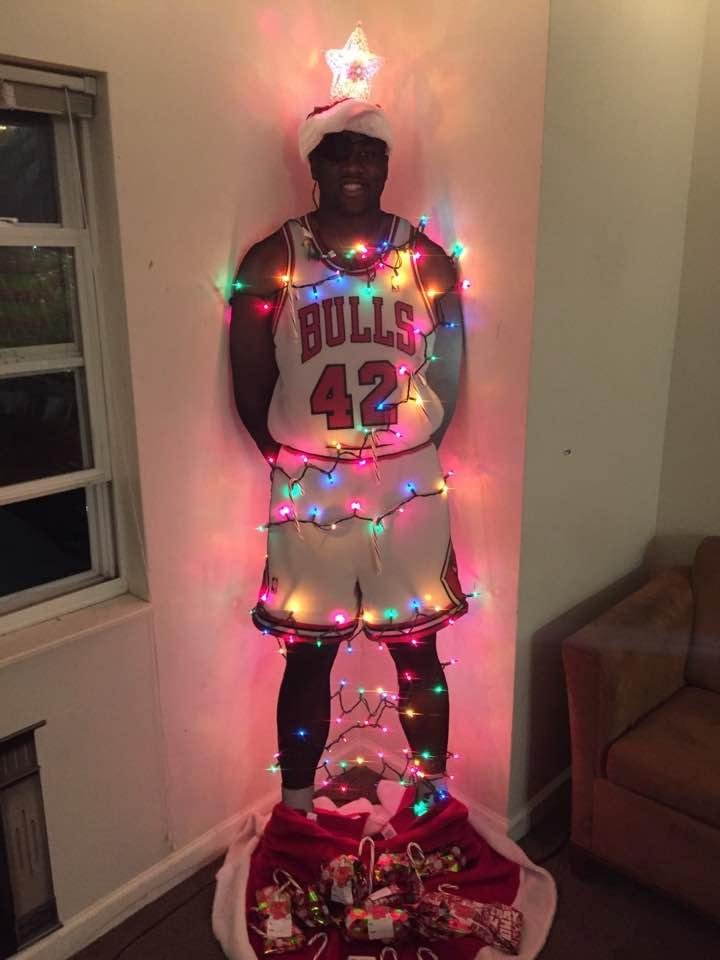 Our son Connor's Xmas tree in his college apartment. It's 6'9" Elton Brand it looks awesome. Merry Christmas to all!