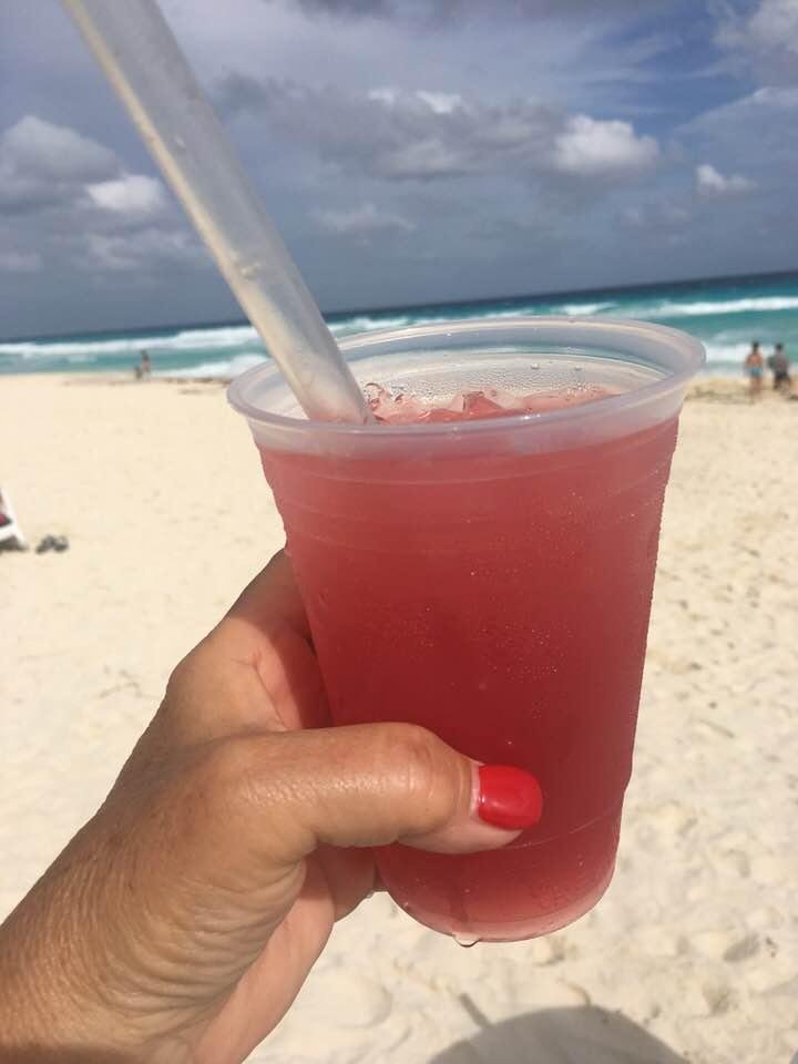 One last Sea Breeze on this sunny windy day on the beach in Cancun.