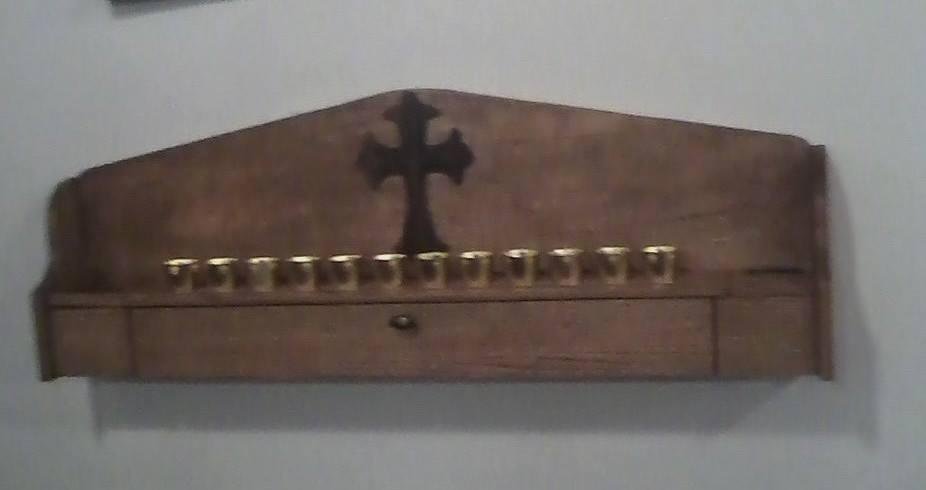 Last year we added this Votive Stand. Some thought it was a big change. However, through quiet talks it was well received. I feel blessed that people use far more than I dreamed. This morning, before Mass I lite a candle fo