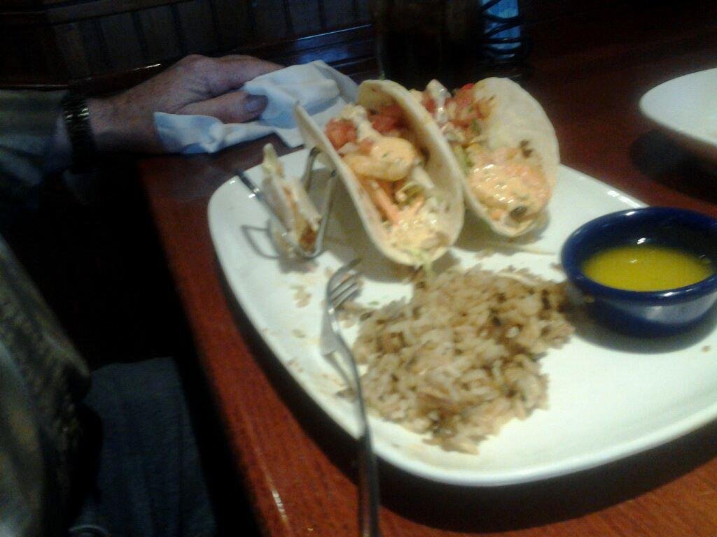 David Burton eating lobster tacos
