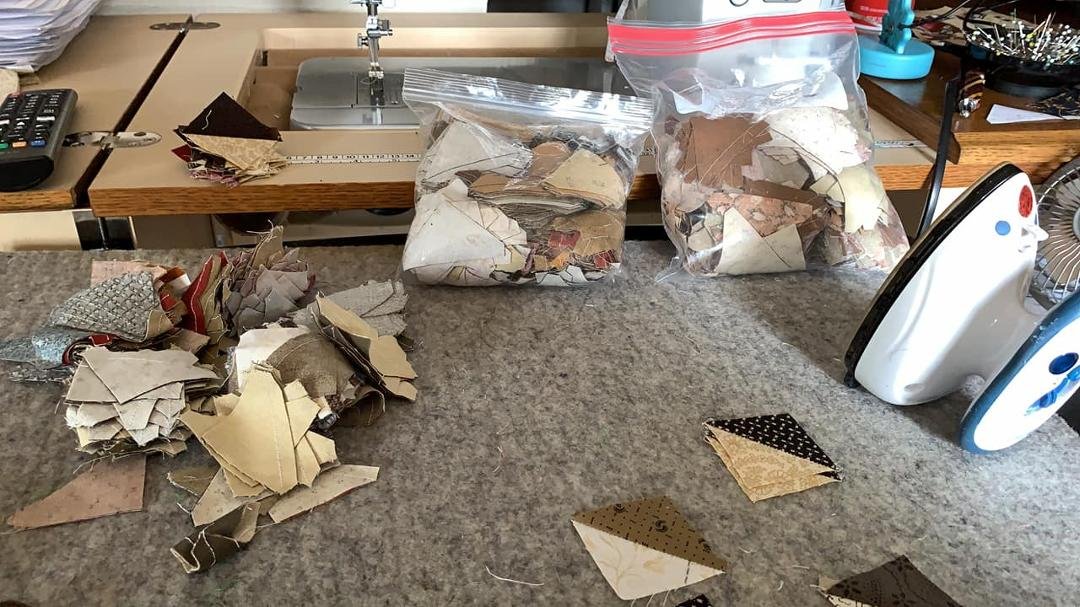 Time to press hundreds of 1 1/4” half square triangles for a quilt I’m making! I plan to use these inside square in a square blocks, set them on point in columns with black calico strips between. No pattern…just designing