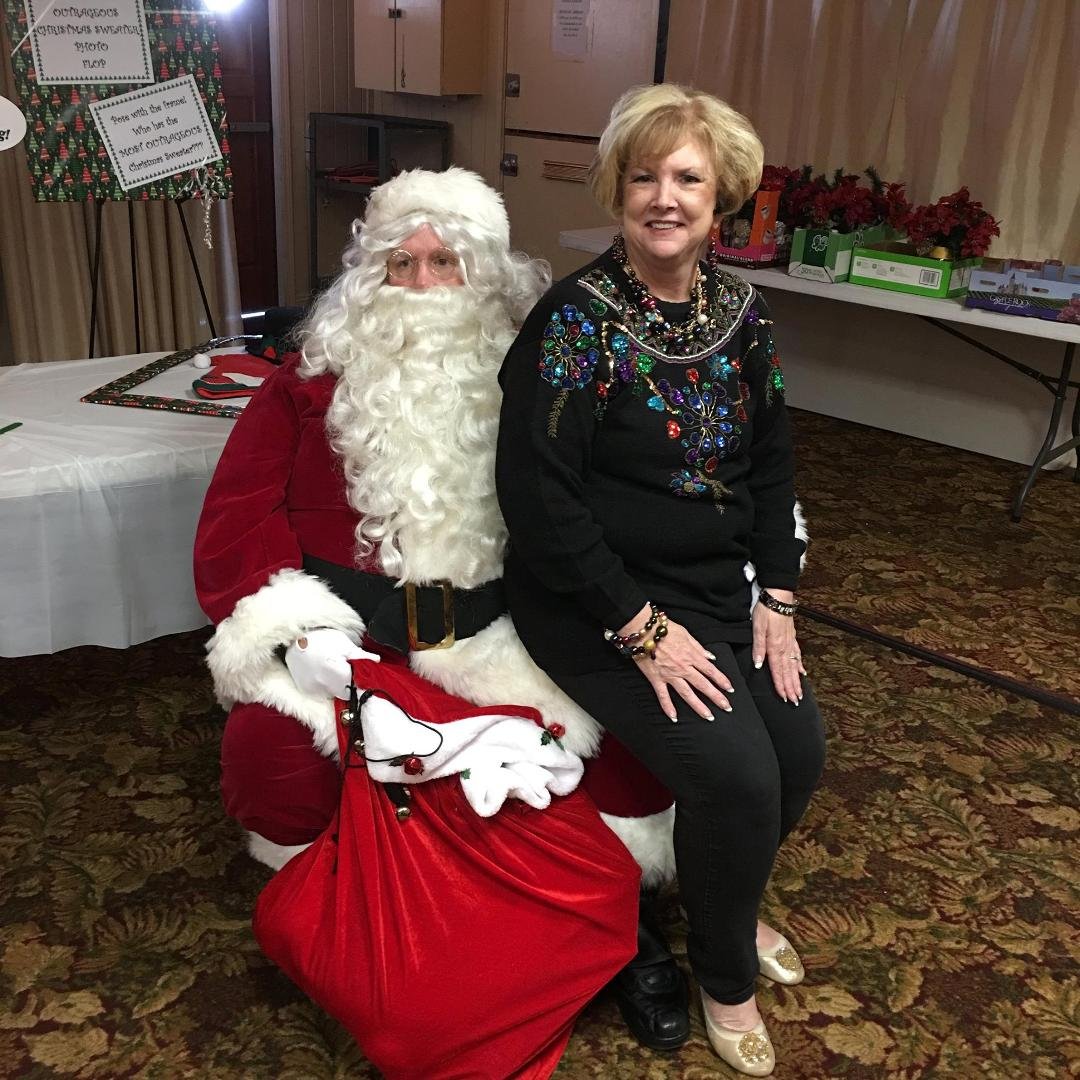 And of course, what is any Christmas Party without the jolly ol' man himself...Santa (aka Garry Jones) and I just happen to get a front row seat! Must not have been too naughty this past year!!! LOL