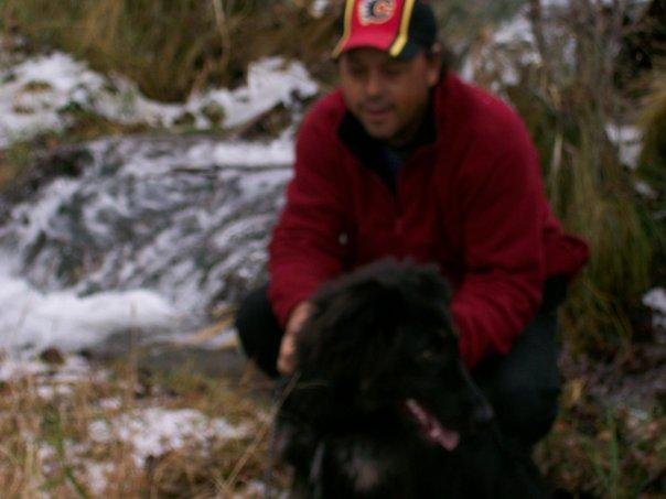 Myself and my dog Shiloh. Taken last spring at Big Hills Spring Provincial Park NE of Cochrane Ab. Just West of Calgary. He's much bigger now. Weighs about 90 lbs and is a total attention suck