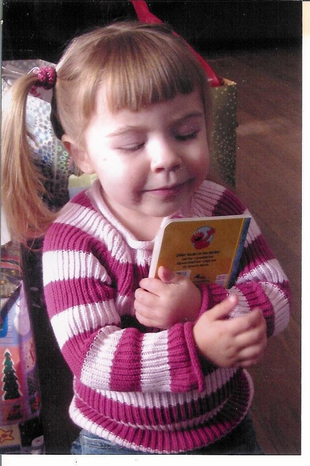 Avery loves her new book that she received from Uncle John.