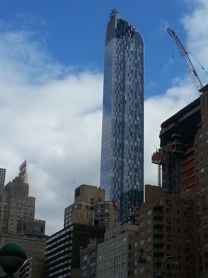 An infamous "needle" tower, rising just south of Central Park, near Columbus Circle.  Future home to Russian billionaires.