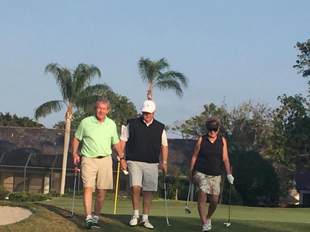 With Paulette and John Condon.  Great day with Linda driving the golf cart.