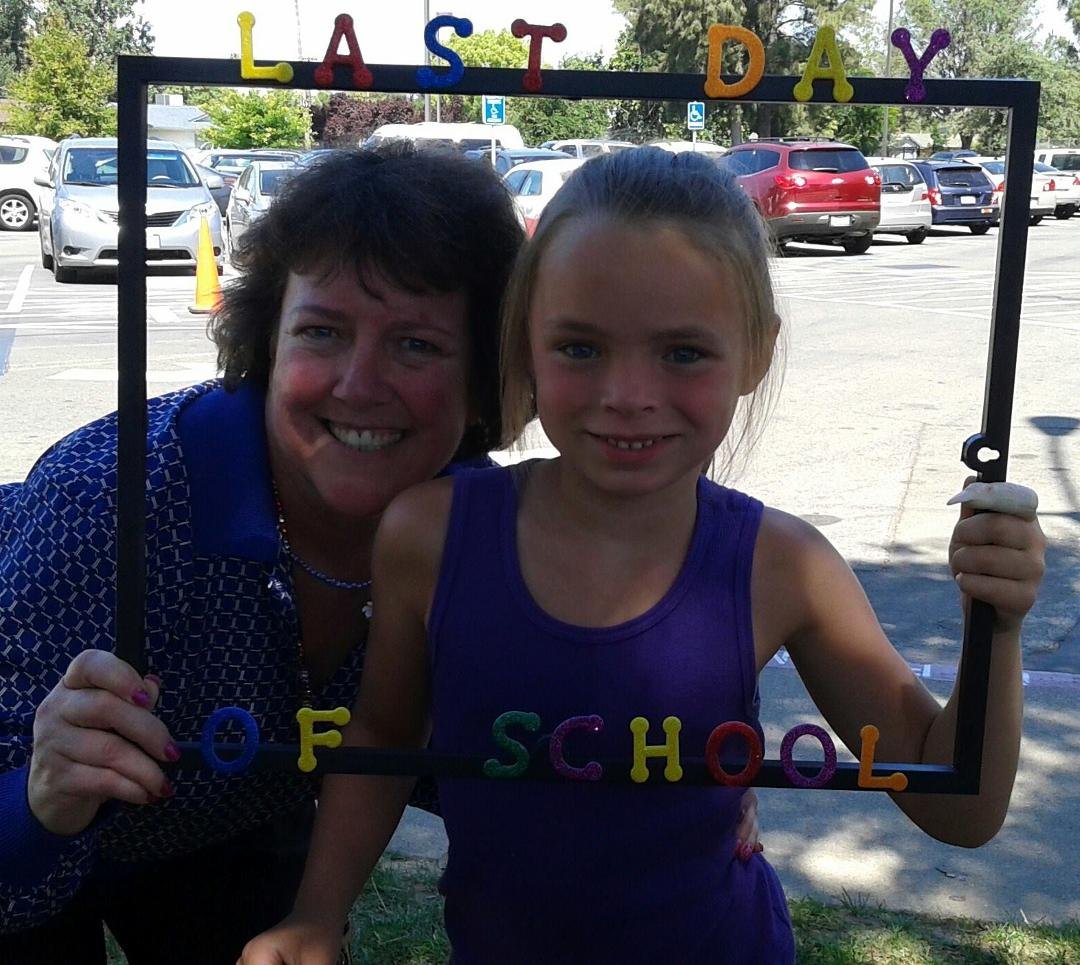 Don't know how to update my profile picture, but this is Kaylee, one of my Kinder students, and me on our last day of school. Very excited! :)