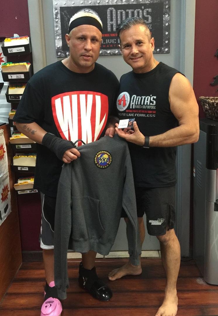 Getting my WKL World Kickboxing League Life Time Membership from my brother Manny Reyes Jr. Manny was also here to do some training and promote his next WKL Kickboxing match.