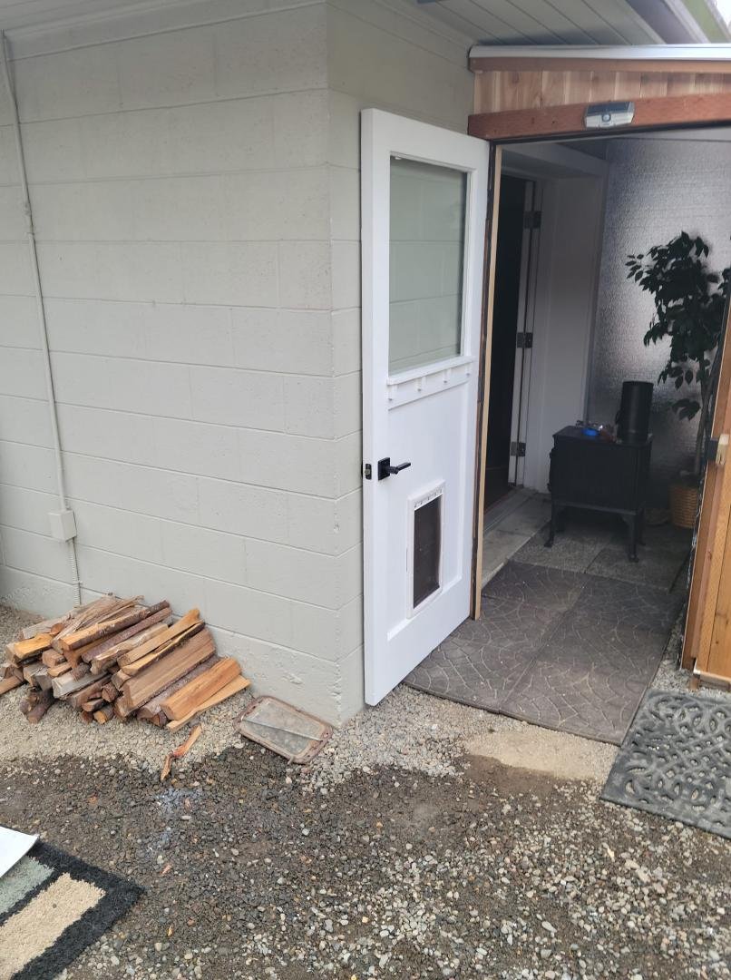 New home for an old door, showpiece doggie door installed too funny all the damage was from a dog scratching the door and now it's at a dog daycare !
My house was 8 years old when this door was built the deadbolt was fun to