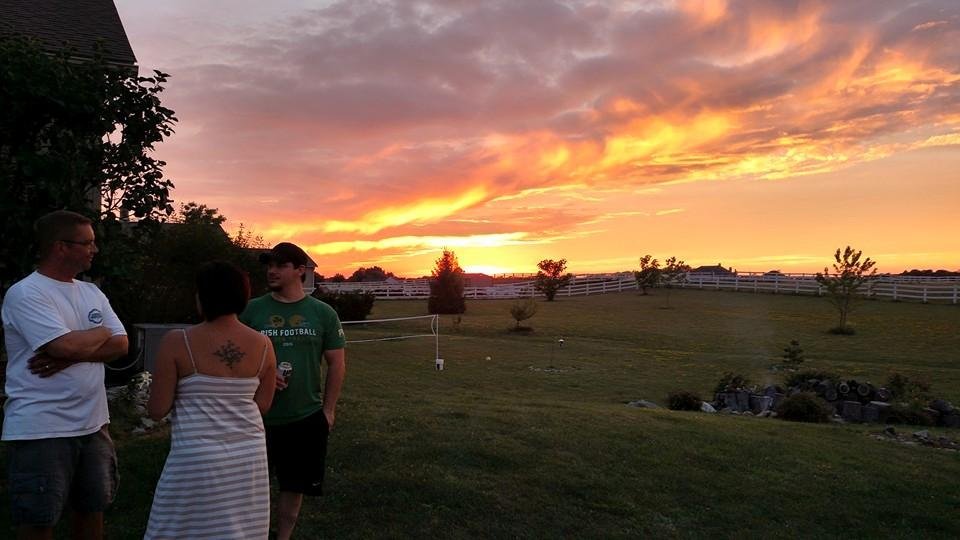 In Jaime Neapolitan Rennecker back yard At sun set