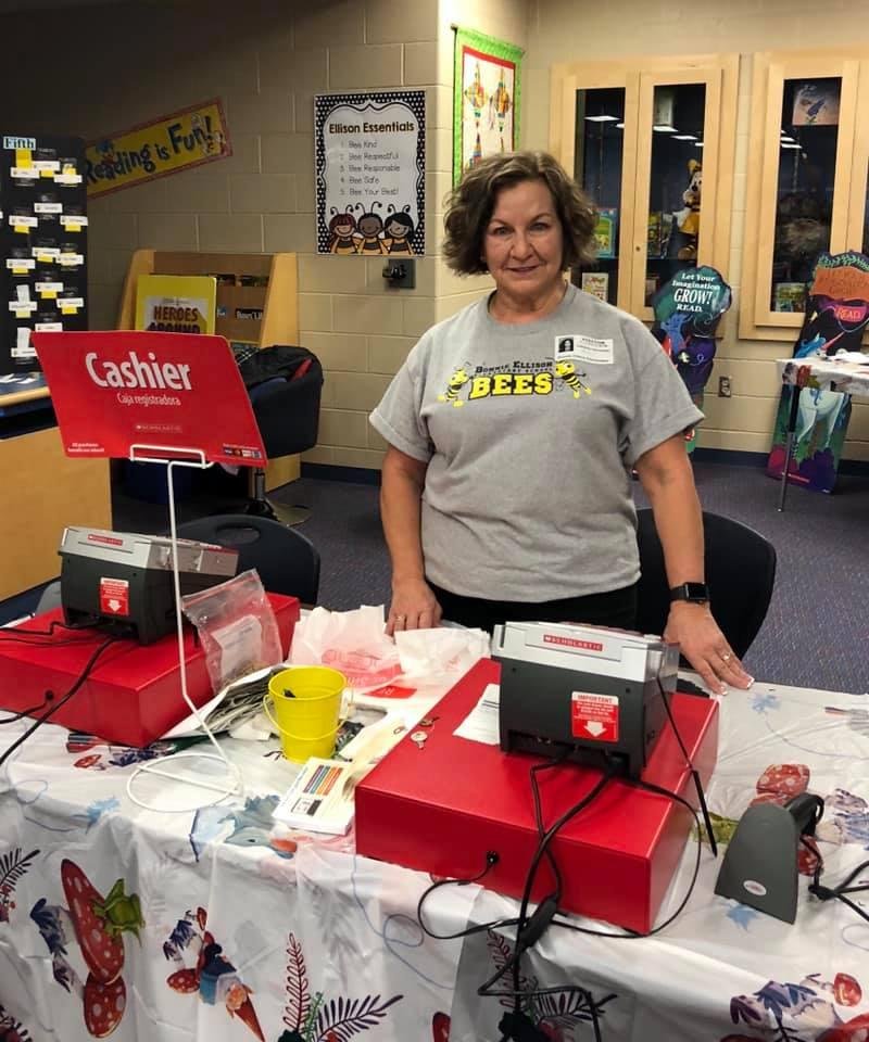 Volunteering at the Book Fair!! Waiting for the grandkids to get out of school!