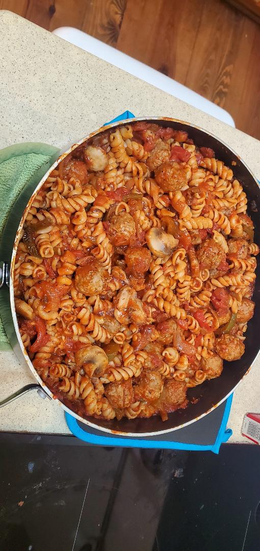 Celebrating Monday! Rotini in garlic/basil red sauce with Italian meat balls, mushrooms, green/red bell peppers, onions and a splash of red wine! (Meals for a full week!)