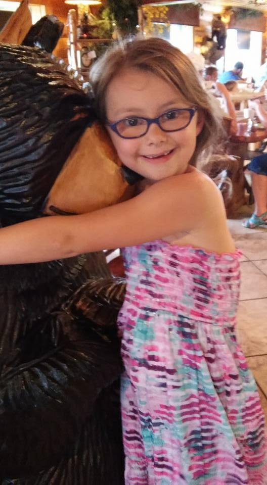 Avery made a new friend after eating a Moomers ice cream cone in Traverse City.