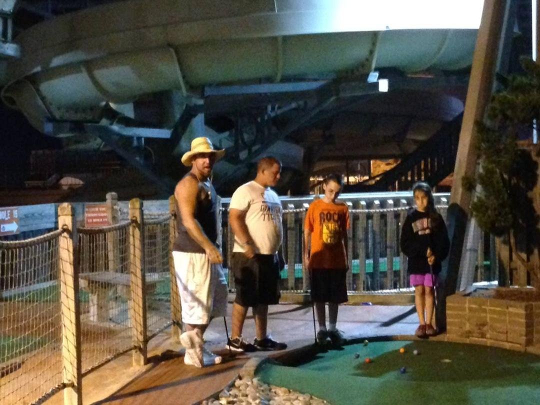 Playing mini-golf.  Last days of summer!