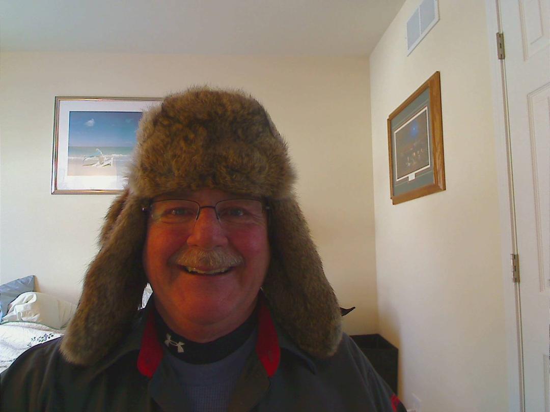 Max has a hat just like this one but I bet he doesn't wear it-- no matter how cold it is or how warm the hat is. I, however, will be working in -35 wind chill today and will be very comfortable; except for my hands... and m