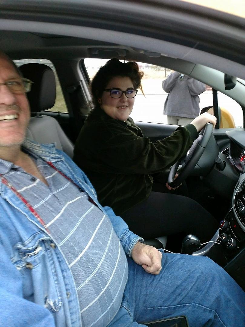 She's enjoying grandpa out on the road.
