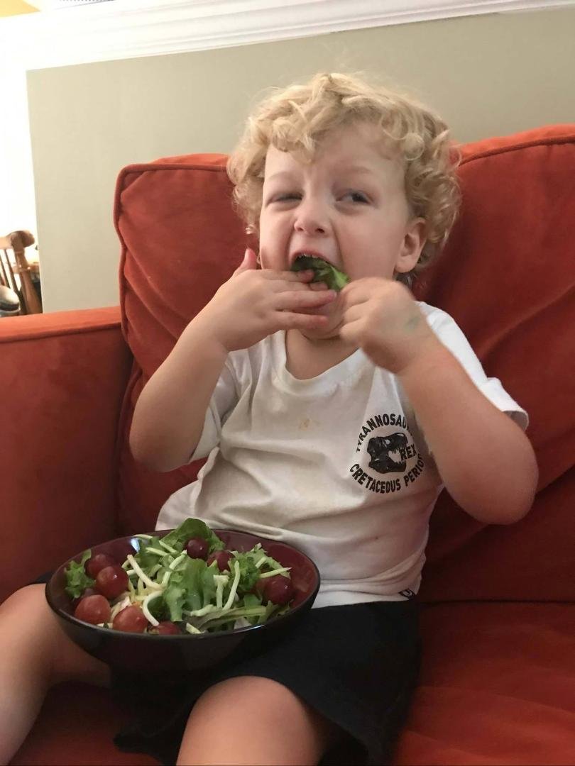 Carter enjoying his vegetables