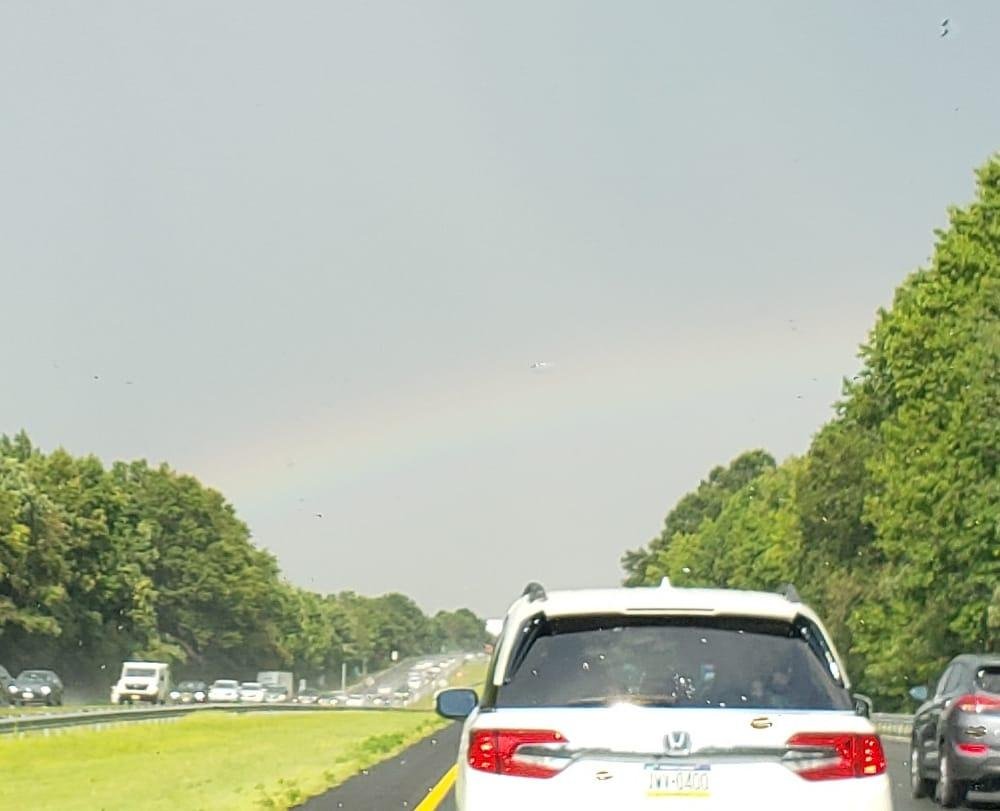 How bout "under the rainbow"?