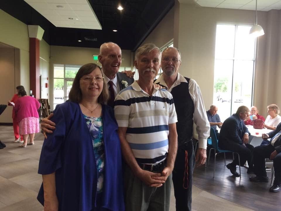 My three brothers and I spending a bit of time together waiting for Christian and Naomi to cut their wedding cake. I enjoyed meeting some family members that I haven't seen in years. It was a beautiful ceremony.