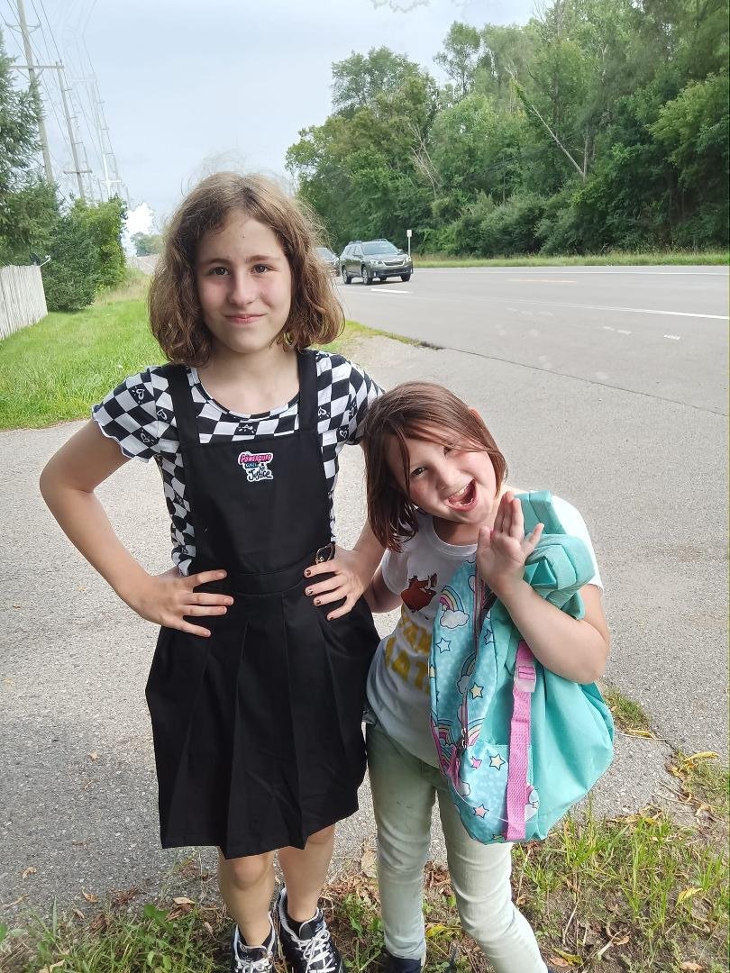 Buddy's back from school first day went great she earned a Hershey's Kiss
