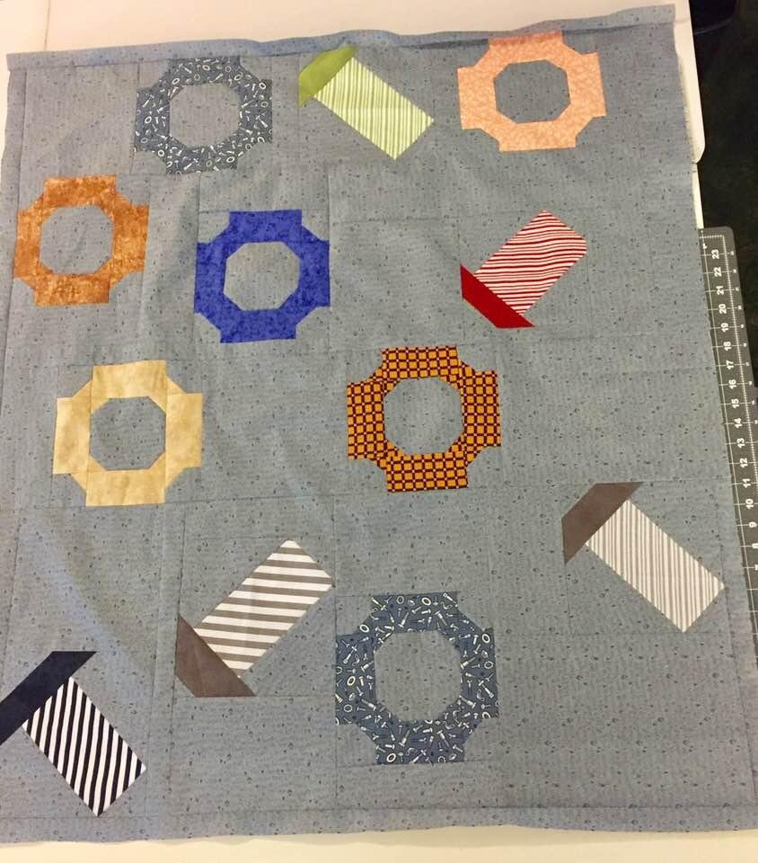 This will be a quilt for a boy. It’s called Nuts and Bolts and yes, I guess i’m a bit of a sexist!! If it were pink it would be for a baby girl.