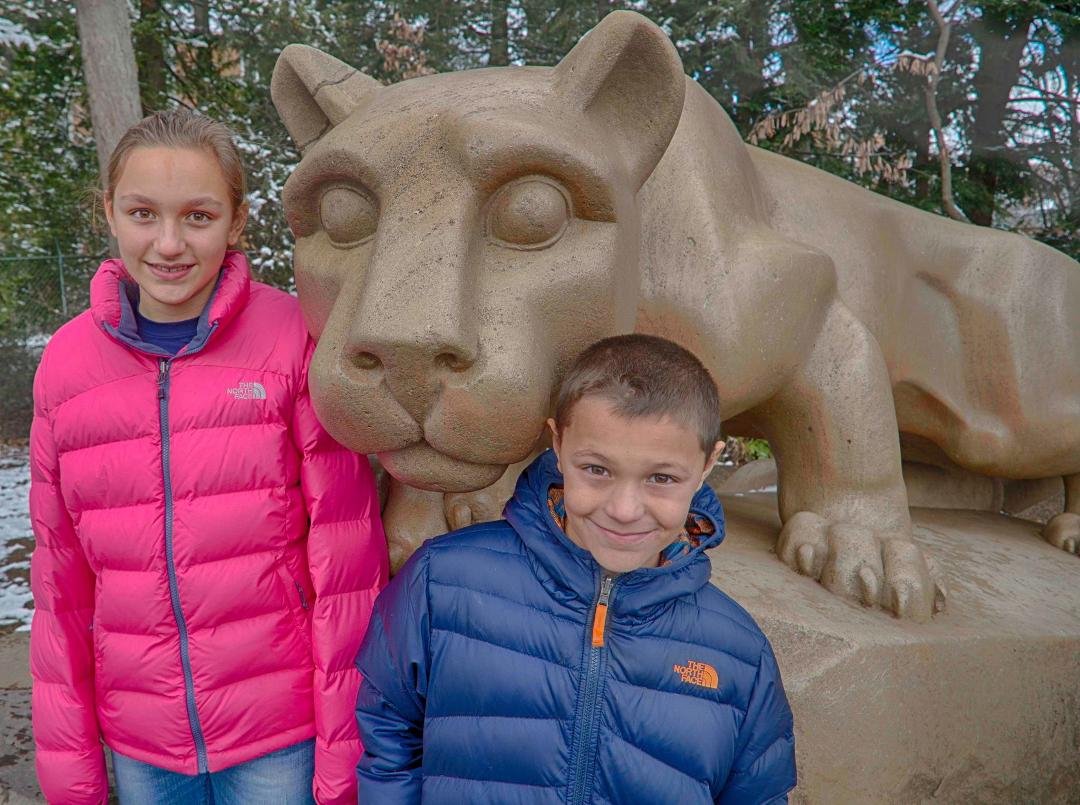 If I photograph grandchildren with the Nittany Lion enough times, maybe they'll go to Penn State. Here are Maya and Luke.