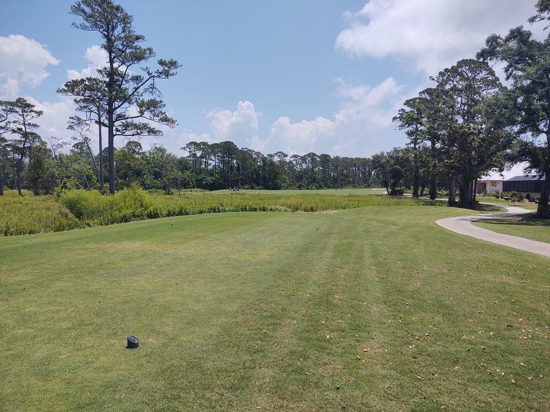 Played golf today at Peninsula Golf and Racquet Club in Gulf Shores, AL. Well, I played golf on the front nine, I don't know what you'd call what I did on the back nine. Pic from the tee of the 7th hole on the Marsh .