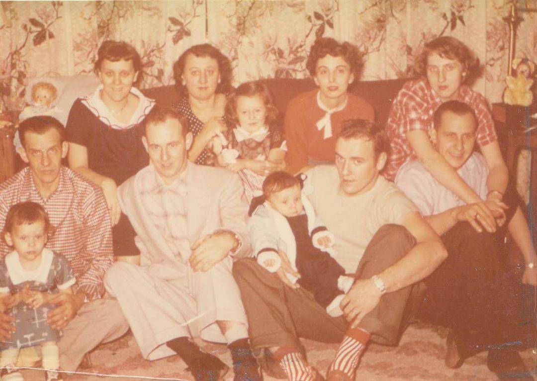 Happy Father's Day Dad!! I miss you!! He's the guy, far left with the cute little girl!! My mom is far left in the ladies row.