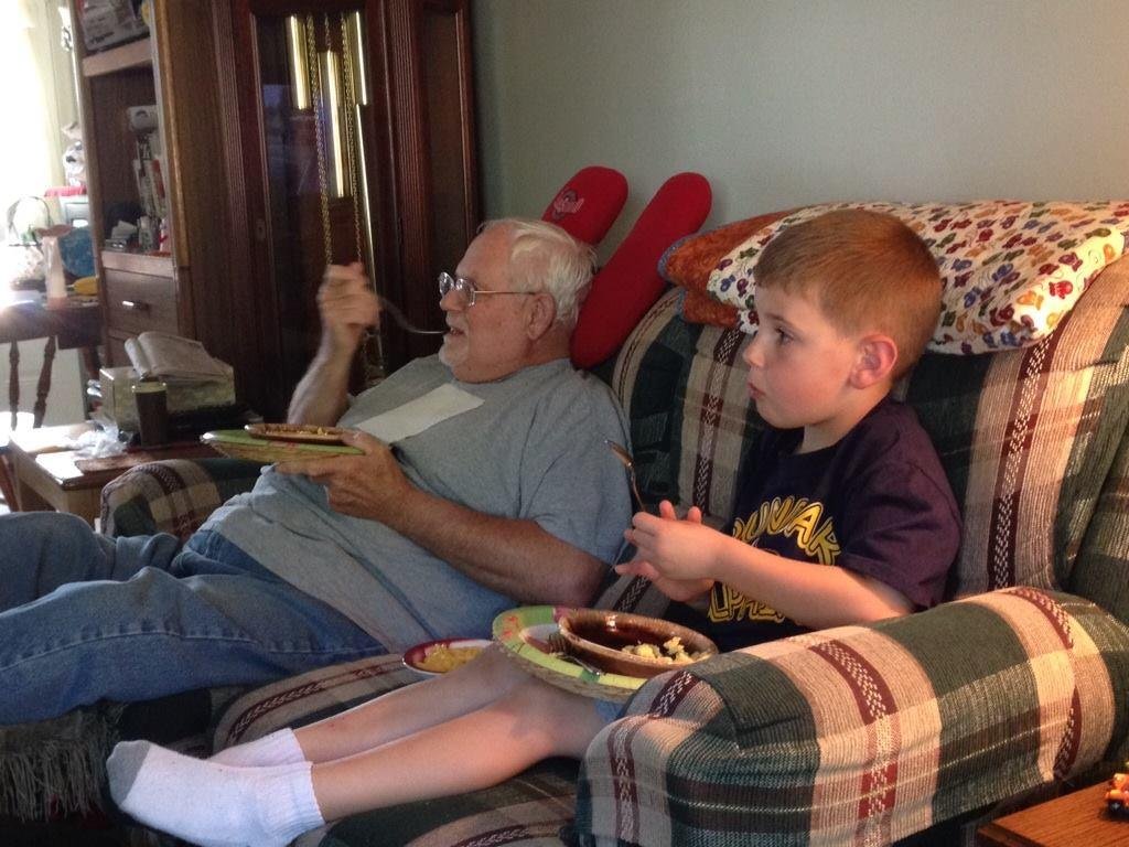 Andreas and his papa.  He loves making scrambled eggs when he comes here.