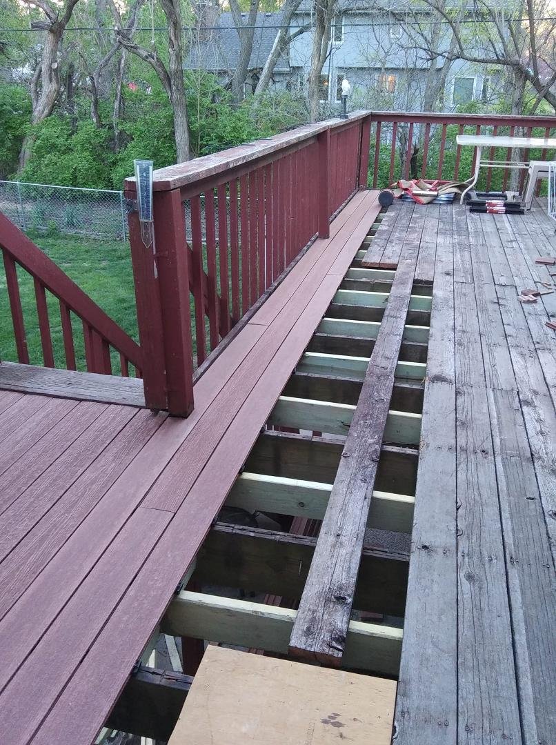 We finally saved the money to start working on the deck. Bob beefed up the joists and now putting on the trex ultra. This stuff is nice.