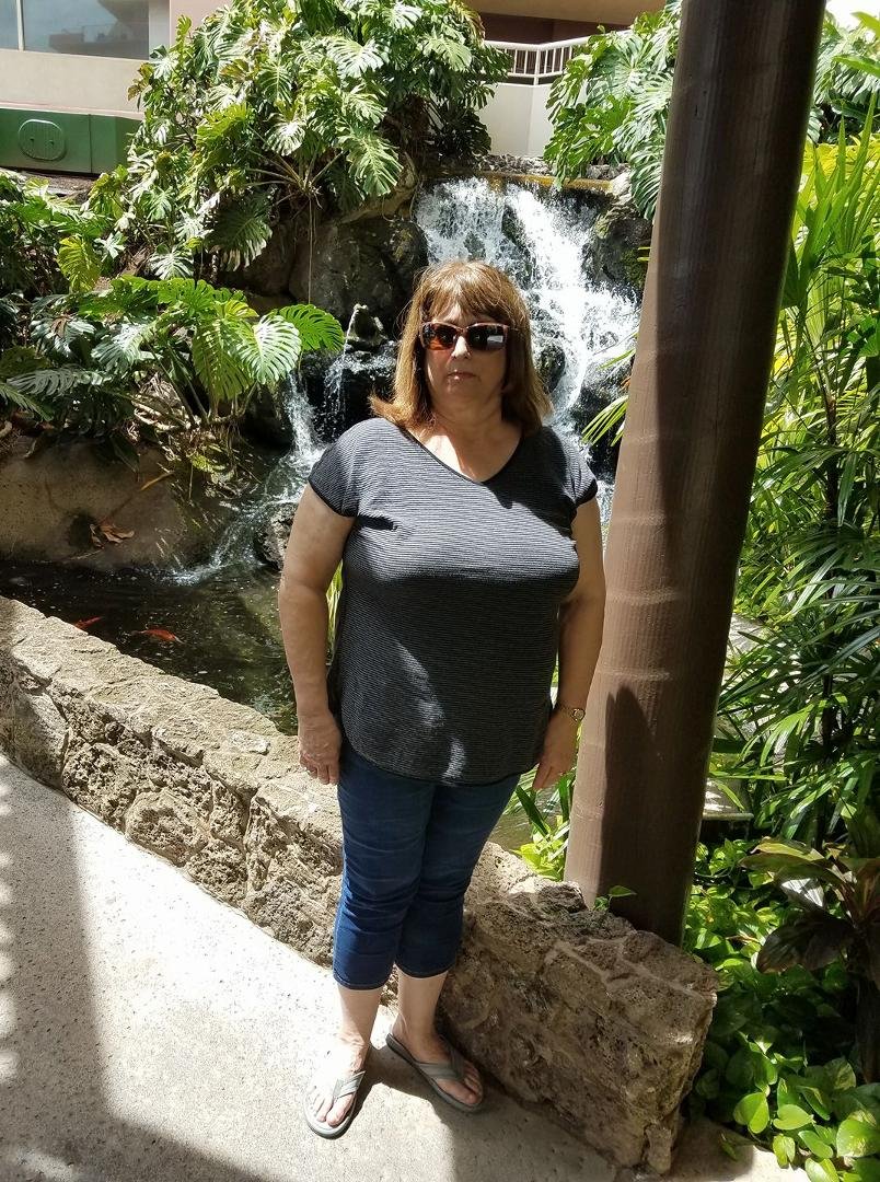 Beautiful woman and a waterfall
